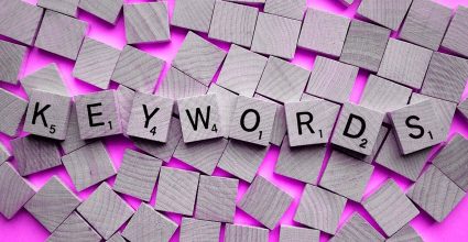 Scrabble tiles depicting the word "Key words" 