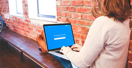 Person on laptop viewing sitecheckerpro