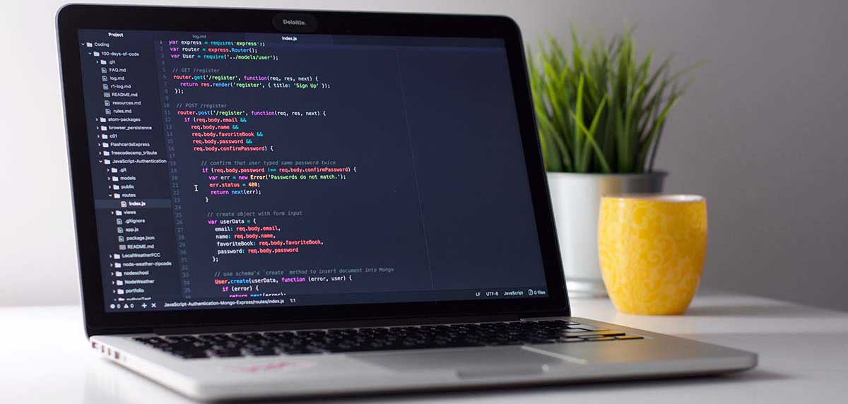 Laptop with code on the screen